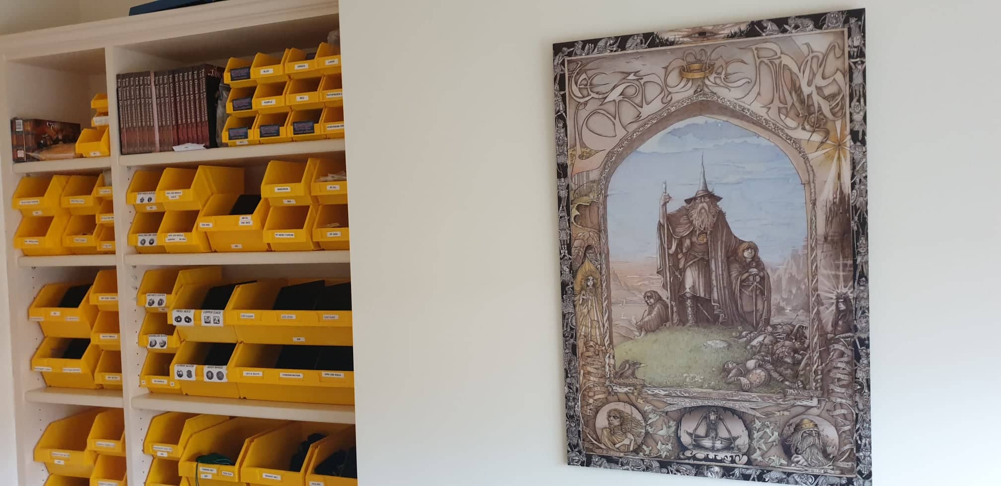 Image of our packing room with Lord of the Rings poster