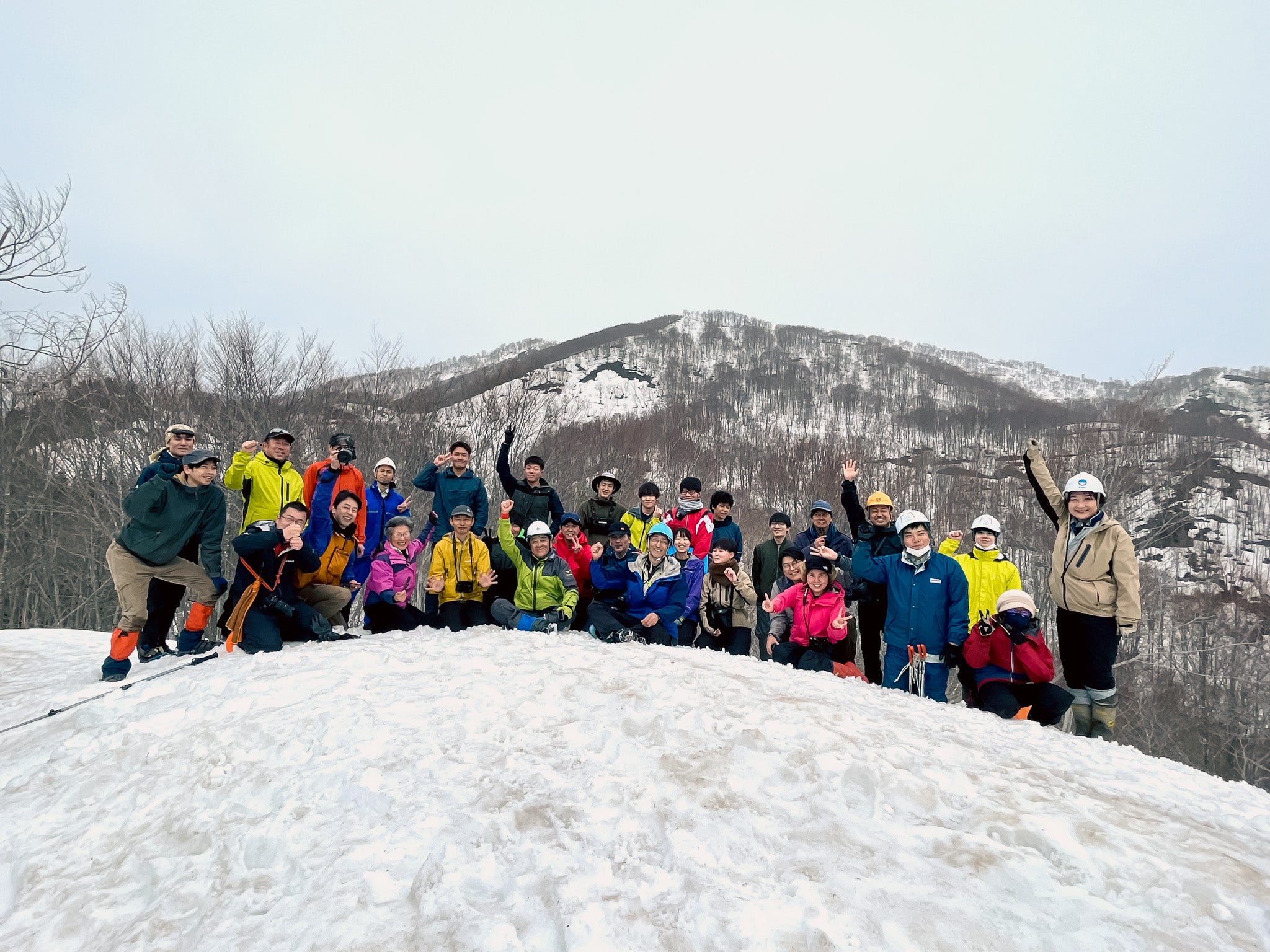 Volunteer members take a break at the summit