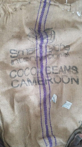 Cacao beans in burlap bag shipped from Cameroon to Denver, Colorado.