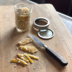 Liz slices a few pomelo peels to enjoy at breakfast