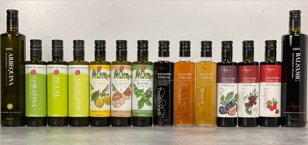 12 everyday olive oils and vinegars in the short 375 ml bottle are shown between the 2 tall 750 ml bottles we sell.