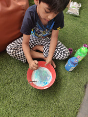 child working with a diy kit