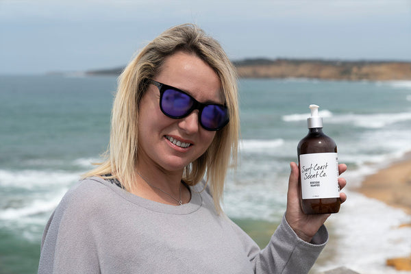Andrea holding a Bespoke Bottle at Rocky Point Torquay