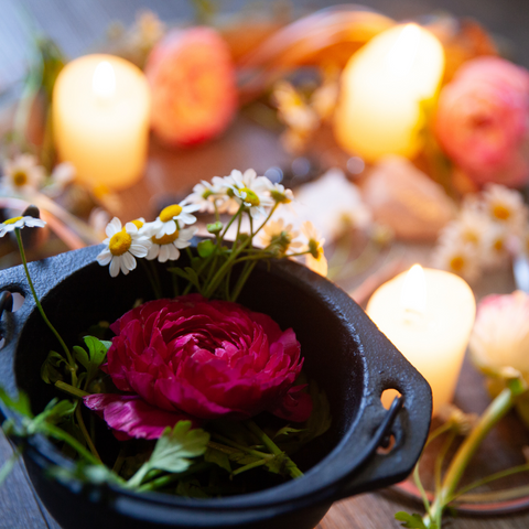 image of candlelight with a small vessel with a rose inside