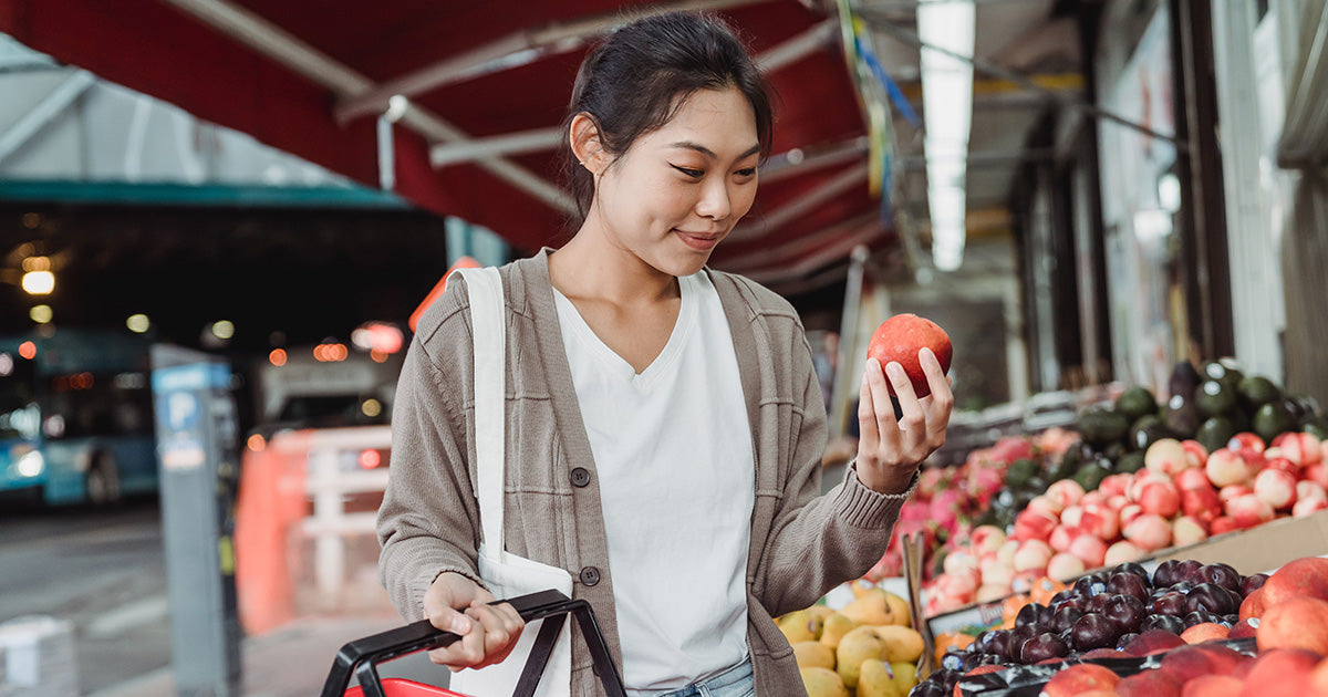 Woman picking ingredients for smoothies