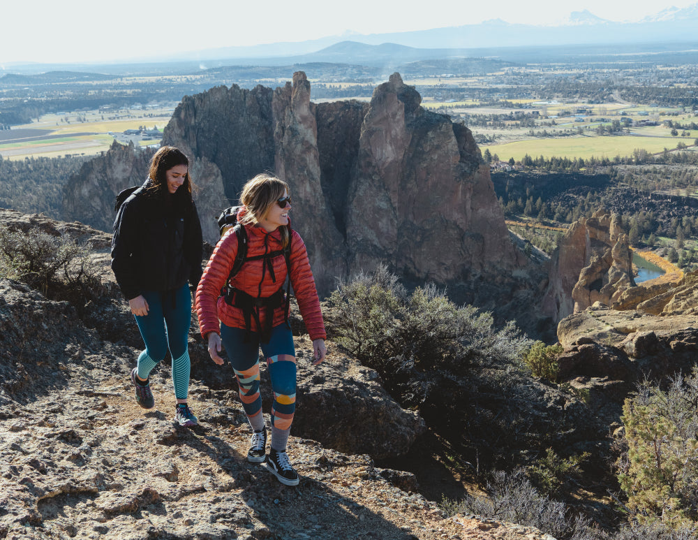 women hiking to a crag in smith rock 