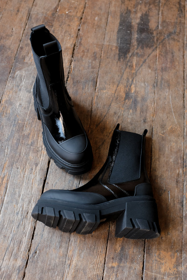 Ganni cleated mid Chelsea boots black patent leather | Pipe and Row ...
