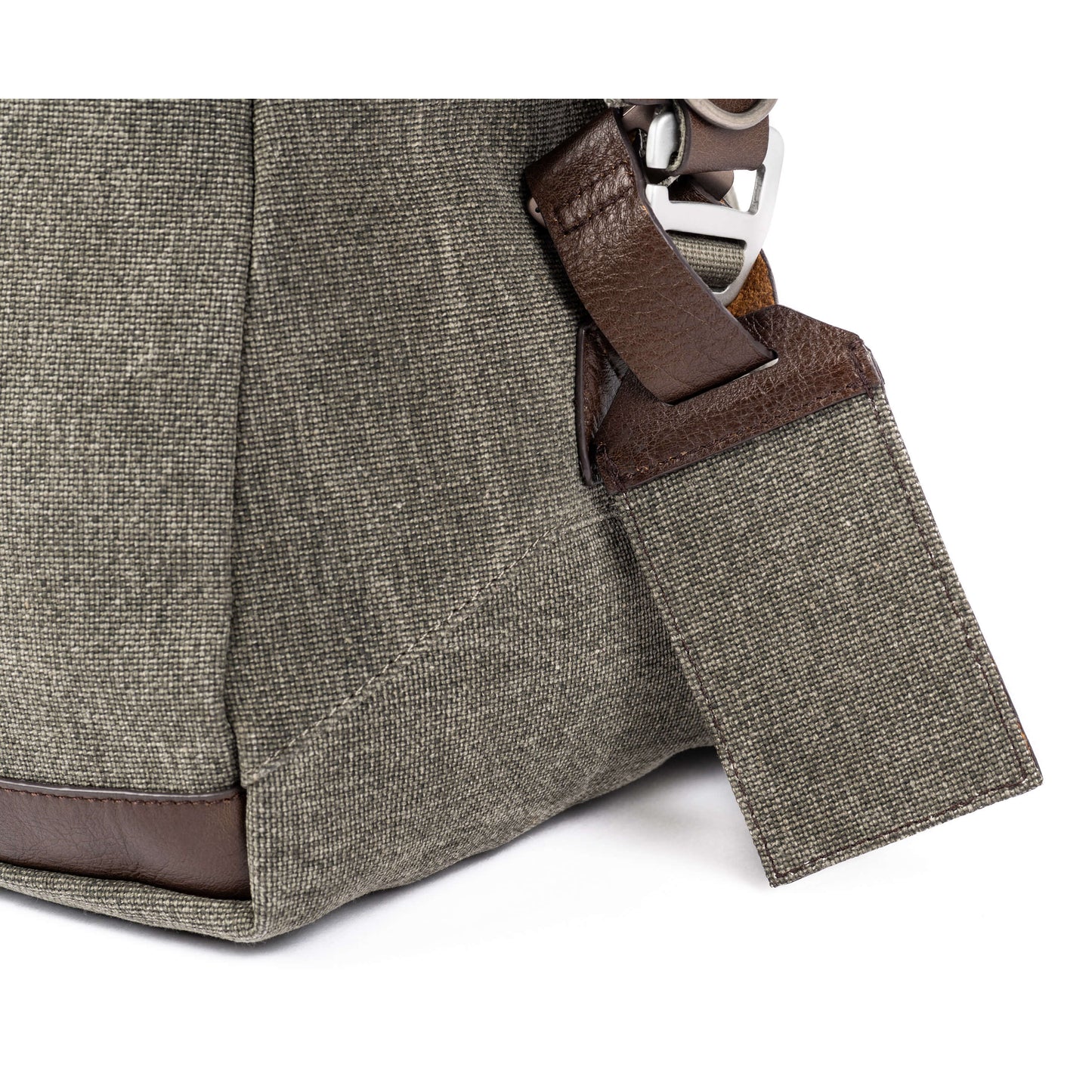 
                  
                    Stone-washed 100% cotton canvas and full-grain leather construction
                  
                