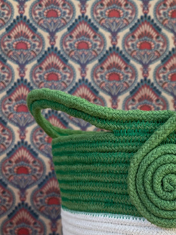 basket made of white and green cotton rope