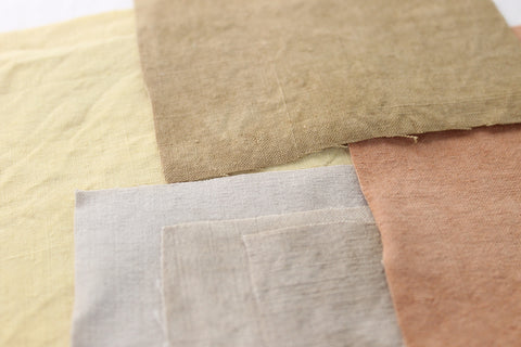 4 pieces of fabrics of different natural colors 