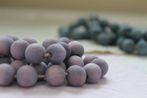 purple and blue wooden beads