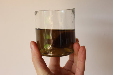 Glass of nettle dye juice