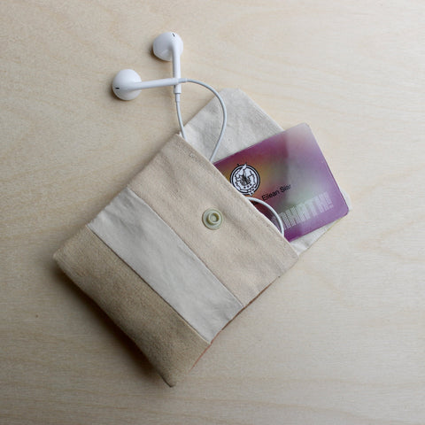 pouch with gym card and earphones