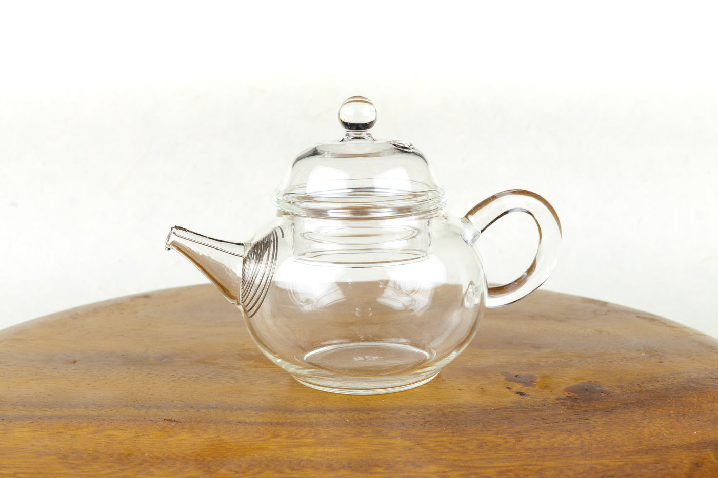 small glass tea kettle