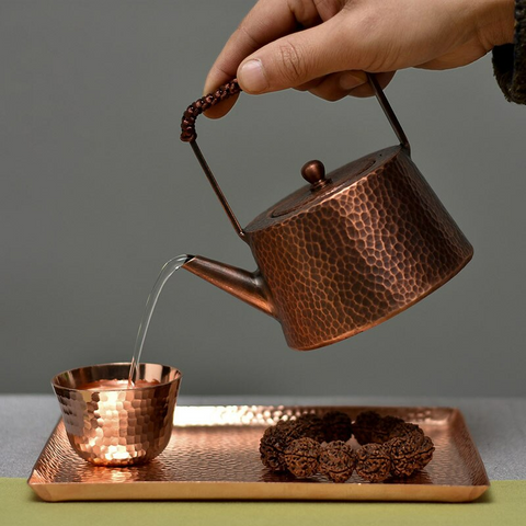 https://cdn.shopify.com/s/files/1/0532/2453/8267/files/4-main-small-metal-teapot-tea-kettle-japanese-handmade-coffee-pot-set-copper-kettle-small-vintage-water-jug-gold-kung-fu-tea-set-gift_480x480.png?v=1671616813