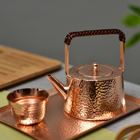 https://cdn.shopify.com/s/files/1/0532/2453/8267/files/5-main-small-metal-teapot-tea-kettle-japanese-handmade-coffee-pot-set-copper-kettle-small-vintage-water-jug-gold-kung-fu-tea-set-gift_480x480.png?v=1671617016