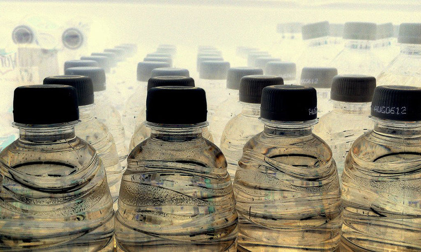Contaminated water collected in water bottles.
