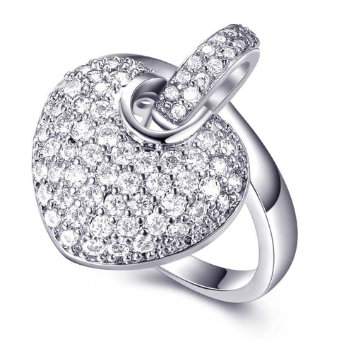 silver ring with heart charm studded with zirconia stones