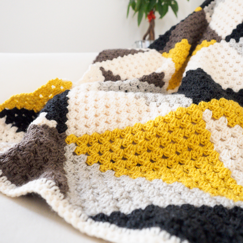 Love Triangles Granny Stripe Baby Blanket by One Dog Woof