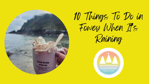 a hot chocolate with cream at Readymoney Cove Fowey on a yellow background