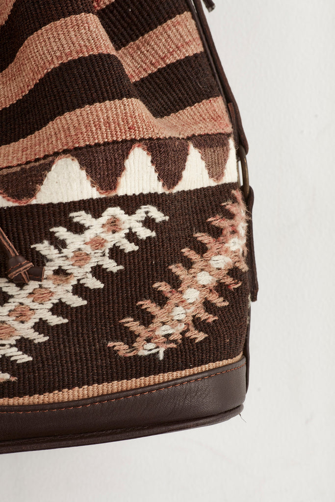Brown patterned medium kilim and leather drawstring handbag pattern detail