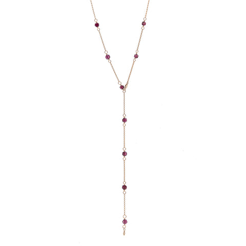Zurina Ketola's Long Upcycled Garnet Hexagon Necklace in 14K gold fill shown as a y-necklace on white background. 