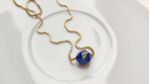 Close up of Zurina Ketola's Rose Cut Lapis Necklace in 14K gold fill. 