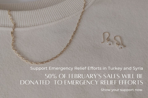 Infographic including a flatlay image of a necklace and earring informing customers that 50% of February sales will be donated to support earthquake survivors in Turkey and Syria.