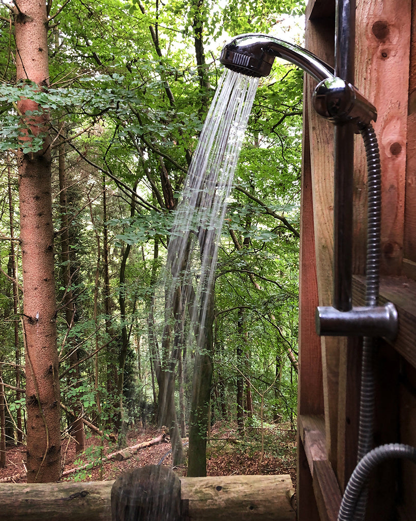 Shower opening out onto the tree top canopy