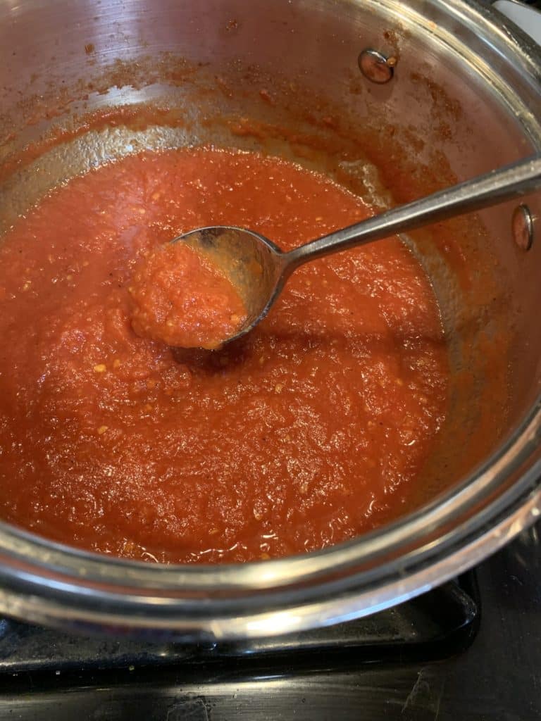 Tomato jam in a pot