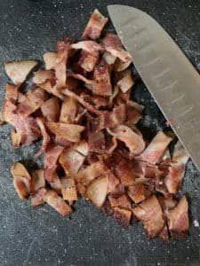 Chopped bacon by a knife