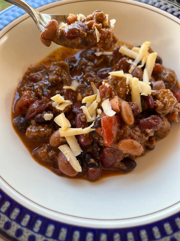 Bowl of chili with spoon