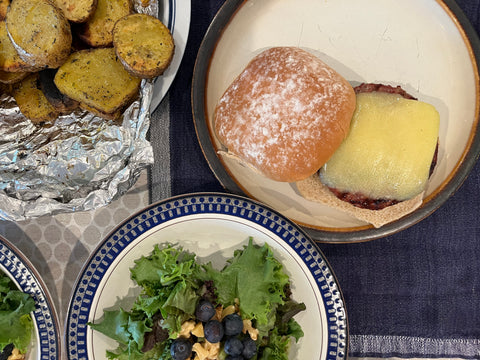 Blended burgers ready to serve, topped with cheese