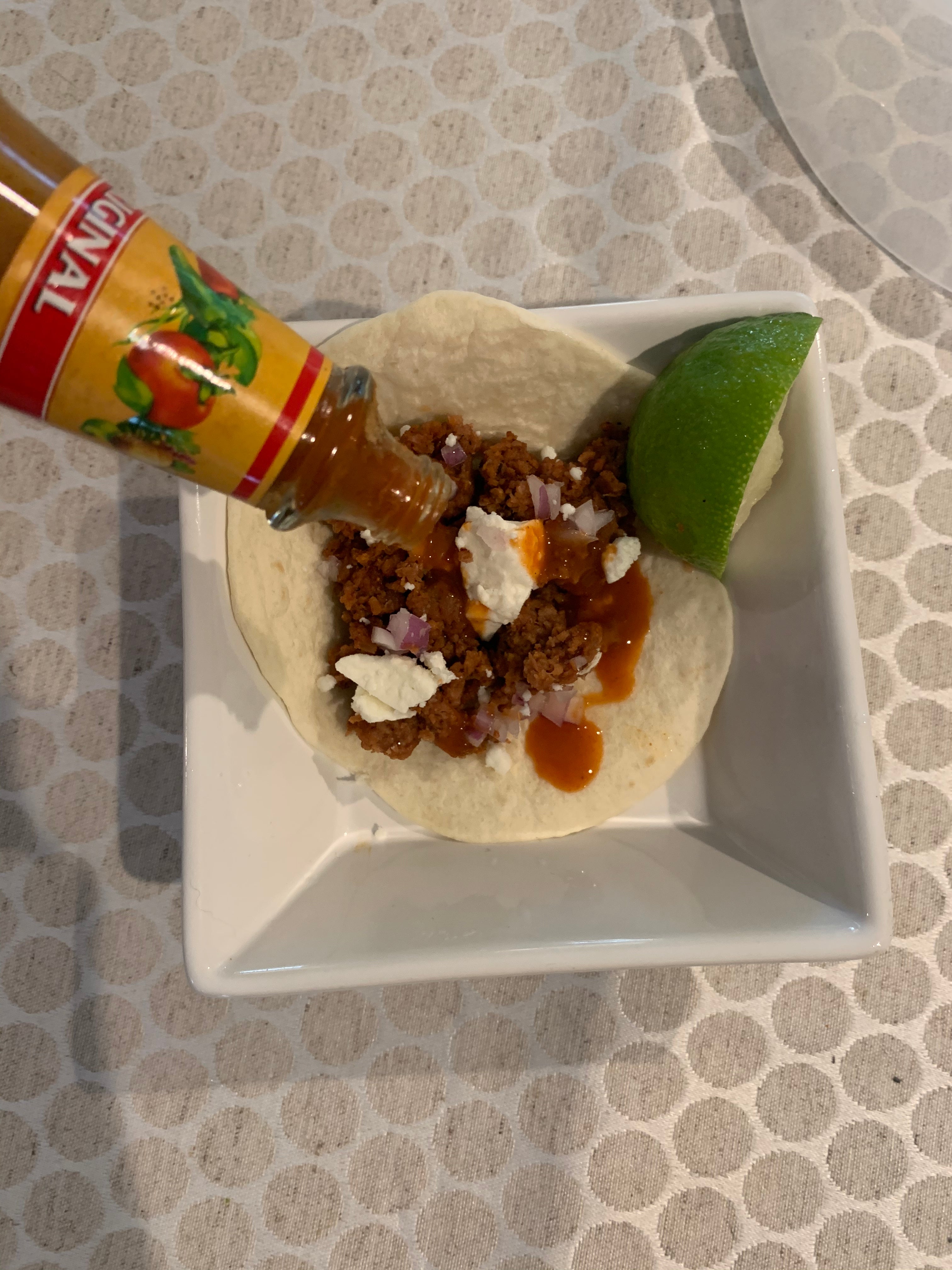 Vegan street taco in a square white dish