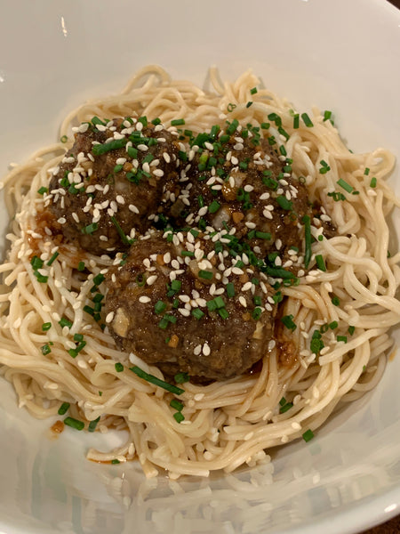 Wagyu meatballs over noodles