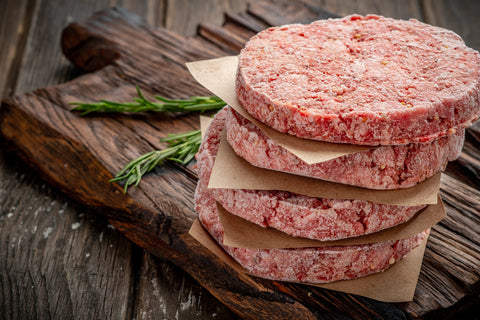 A stack of frozen burgers