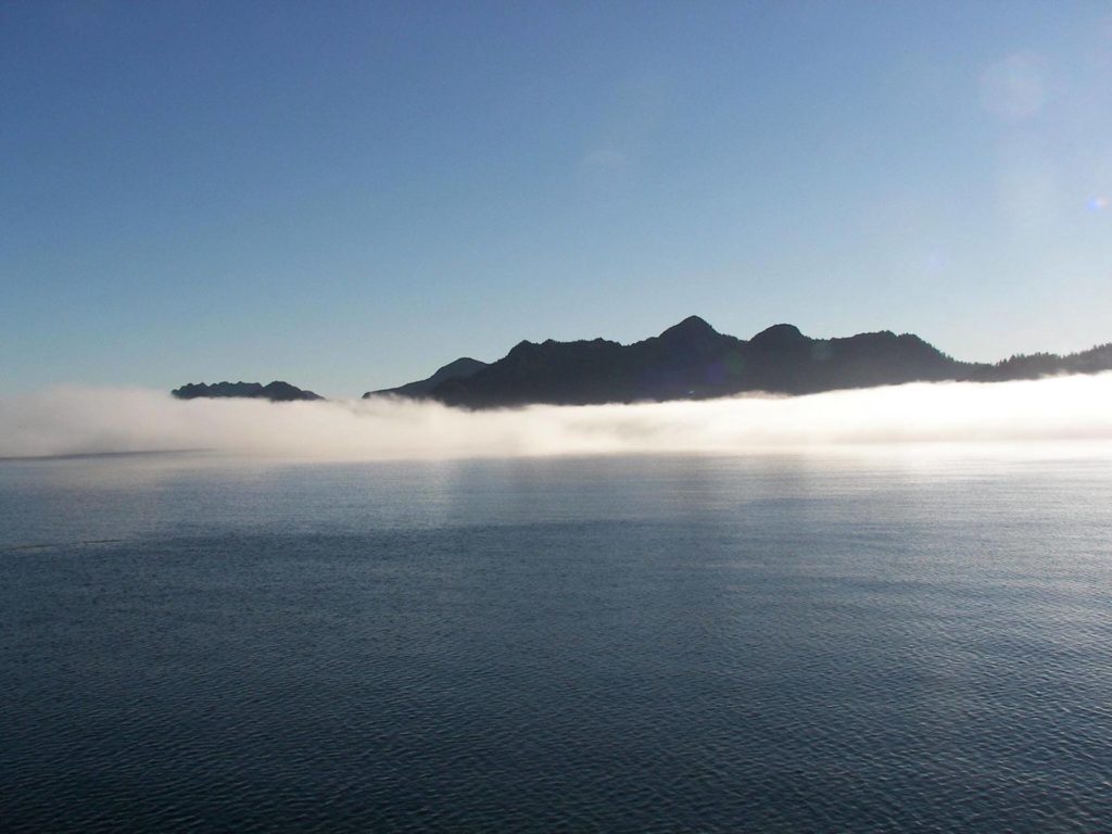 Dense fog resting on the sea - Milbanke Sound