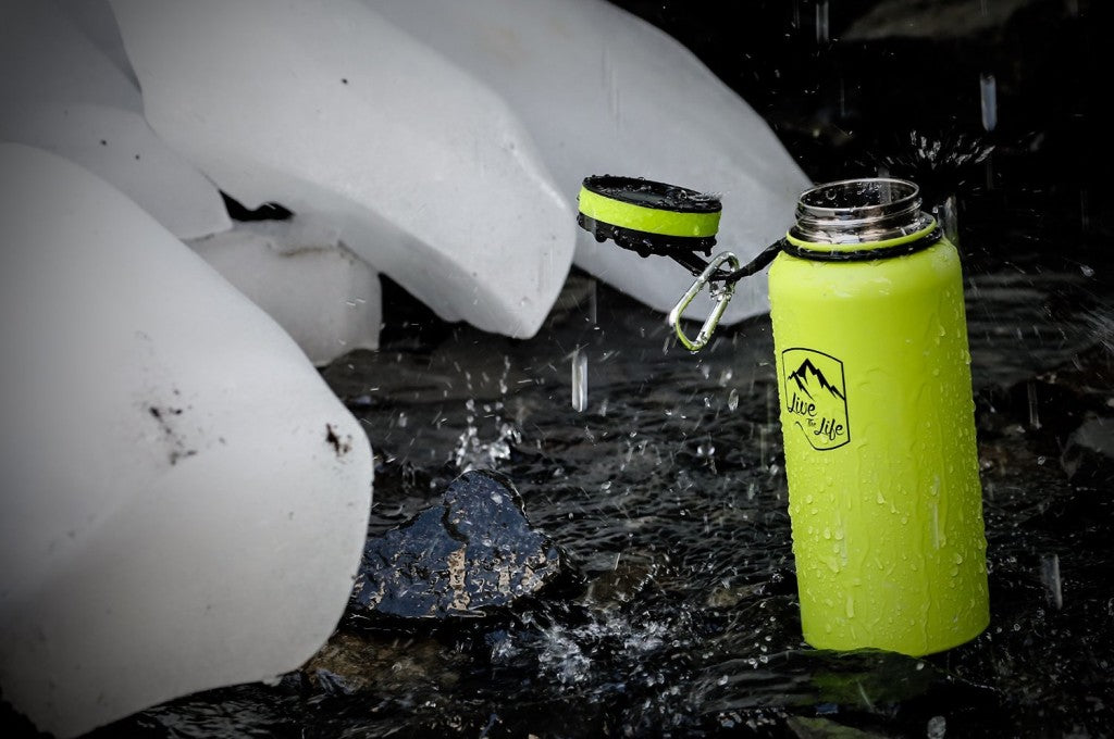 Alaska Life Fan Jesse Fliris Fills his Explorer Bottle With Glacial Water