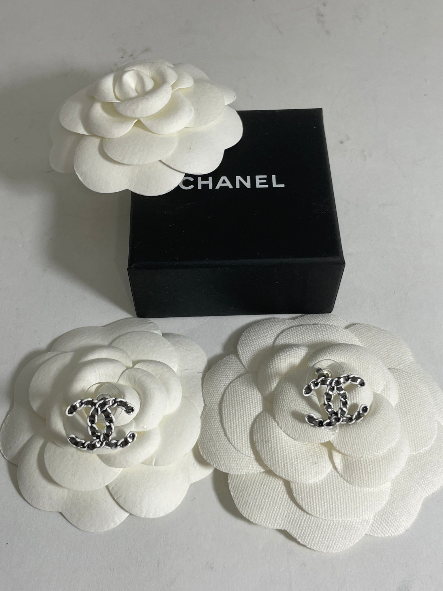 cc stud white earrings