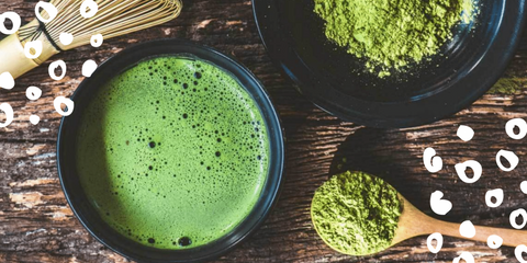 Image of Japanese green tea matcha mix on a wooden table.