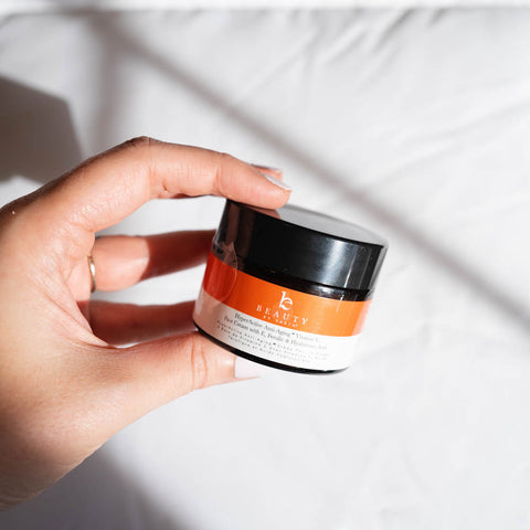 Hand holding beauty by earth hyperactive vitamin c cream