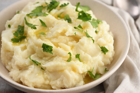 Image of another vegan Thanksgiving dish: mashed potatoes and gravy.