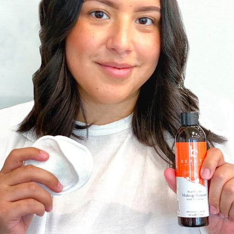 Image of a woman using the BBE makeup remover with green tea (an ultimate clean ingredient), along with the Eco-friendly, Reusable Bamboo Makeup Remover Wipes.