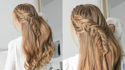 Woman with long hair braided half up into a fishtail braid