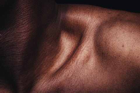 Up close shot of a Black woman's clavicle