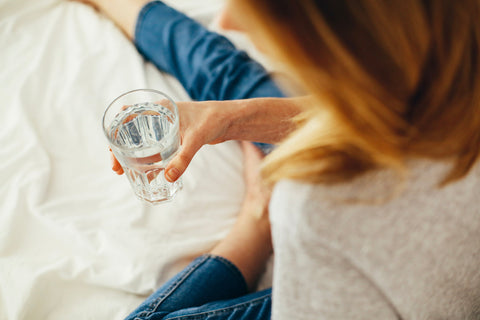 Woman drinking a glass of water