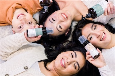 Image of 4 smiling women with BBE products in their hands