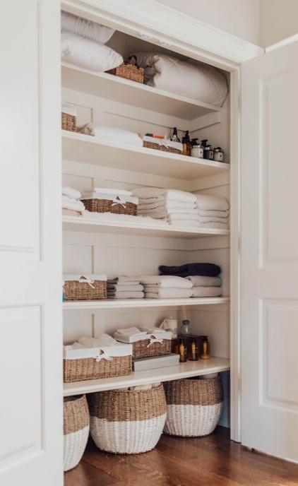 Baskets for keeping linen closet clean 