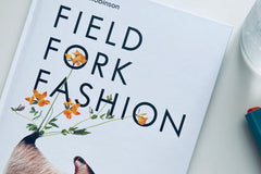 Book titled "Field, Fork, Fashion" by Alice V Robinson on tabletop
