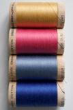 Four wooden reels of Organic Cotton Sewing Threads